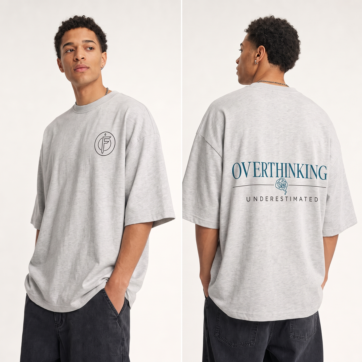 Editorial studio photo of a model wearing an oversized light heather grey Icy Rock heavyweight t-shirt with the OVERTHINKING, UNDERESTIMATED graphic, front and back views, relaxed streetwear fit, clean studio background.